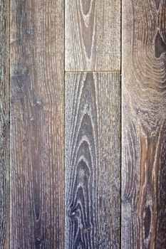 texture of wooden worm colored parquet floor