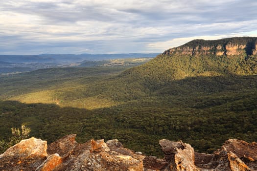 Beautiful views.  Morning light streams into the Megalong Valley just after sunrise.  Blue Mountains Australia