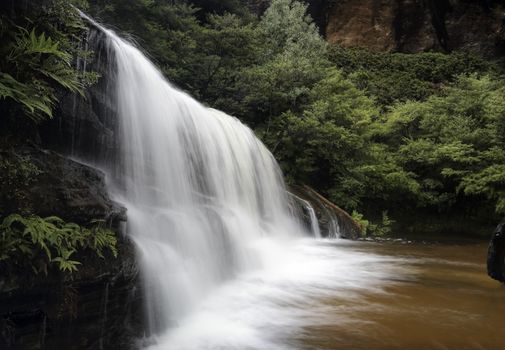 Beautiful waterfall in magnificent full flow