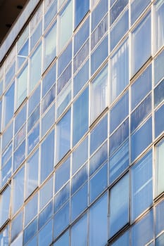 Modern building exterior with glass and metallic facade