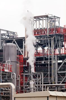 detail of oil pipeline with valves in large oil refinery