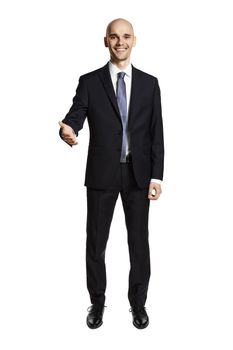 Smiling man greets you. Portrait of man in suit isolated on white background.