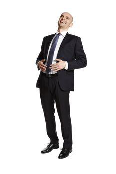 Full lenght portrait of laughing young businessman on white background.