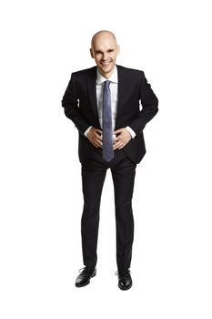 Full lenght portrait of laughing young businessman on white background.