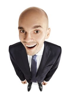 Young bald man looks into the camera. Copy space. Isolated on white.