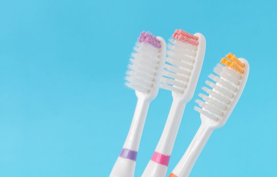 Closeup toothbrush with blue background