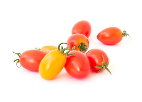 Fresh cherry tomatoes on white background