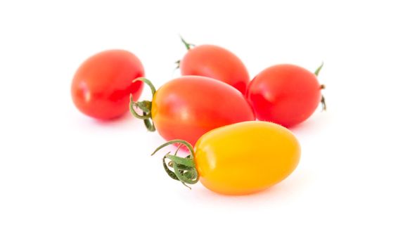 Fresh cherry tomatoes on white background