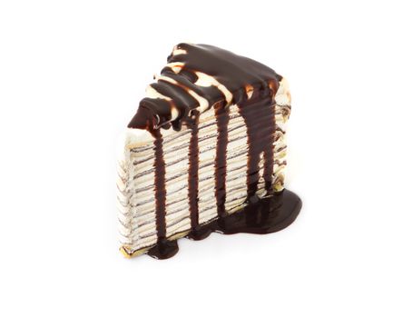 Caramel chocolate Crepe cake with sauce on white background