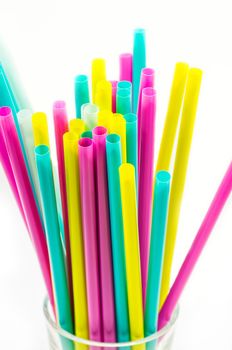 colorful drinking straws on the white background