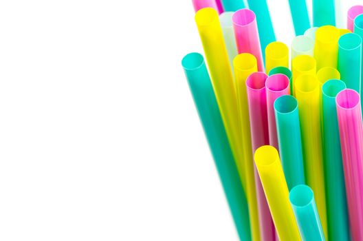 colorful drinking straws on the white background