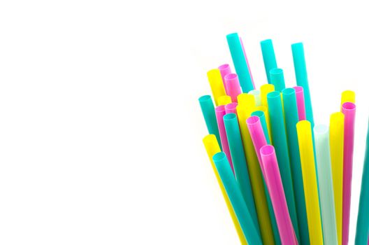 colorful drinking straws on the white background