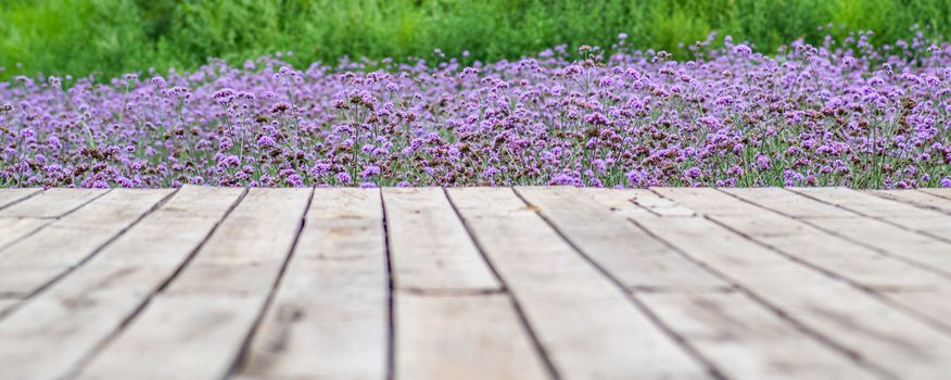 flowers and wooden pierce view. wallpaper