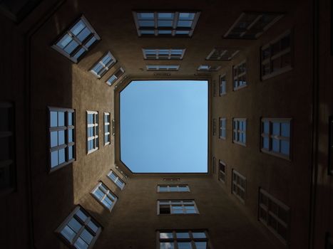 Inside Urban Backyard with Windows and Blue Sky Light Effect