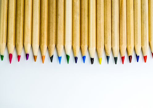 Colorful pencils on the white background