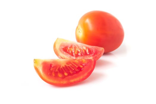 Fresh tomatoe slices on white background, selective focus