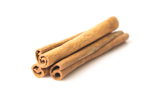 Cinnamon sticks on white background, Raw material cooking food, selective focus