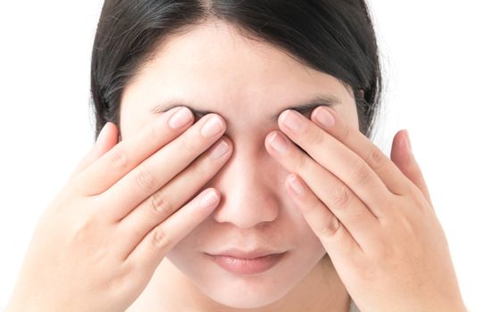 Woman hand closes eyes with eye pain, health care and medical concept