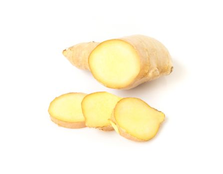 Fresh ginger slices on white background, herb and raw material cooking