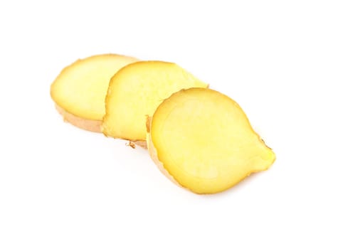 Fresh ginger slices on white background, herb and raw material cooking