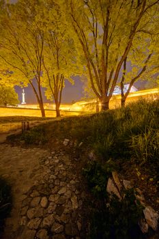 Belgrade medieval walls of fortress and park at night, Serbia