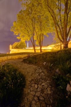 Belgrade medieval walls of fortress and park at night, Serbia