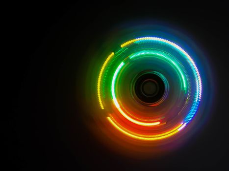 Colorful light neon circle in dark black background