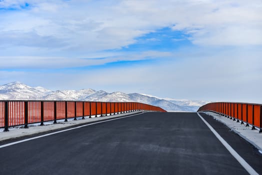 Bridge and road to the mountains