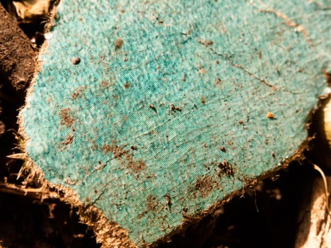close up of old rustic blue cardboard texture on ground worn; England; UK