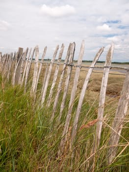 wooden old fence outside coast line walking path; England; UK