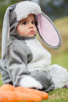 Little baby girl wearing a rabbit costume