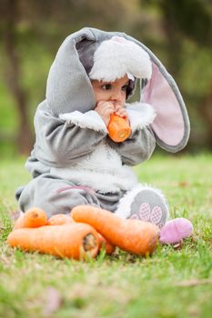 Little baby girl wearing a rabbit costume