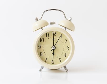 Retro color alarm clock on white background