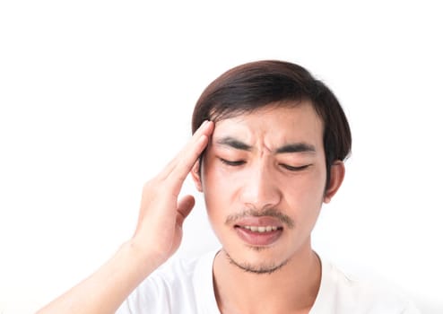 Closeup asian man headache with white background