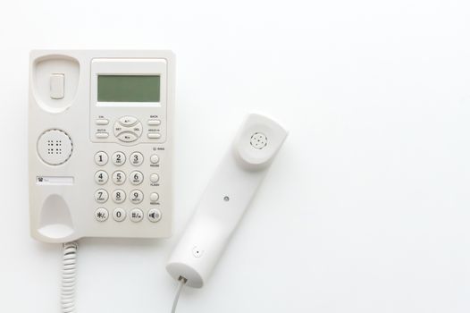 Office telephone on white background, communication and technology concept