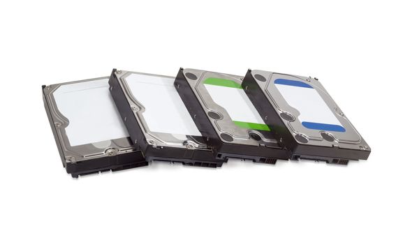 Several different SATA hard disk drives for use in desktop computers on a white background
