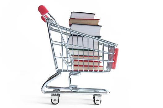 Large stack of books inside a shopping cart