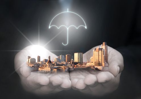 Business man holding company buildings with umbrella protection