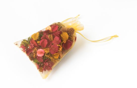 Color of dried flower in bag on white background