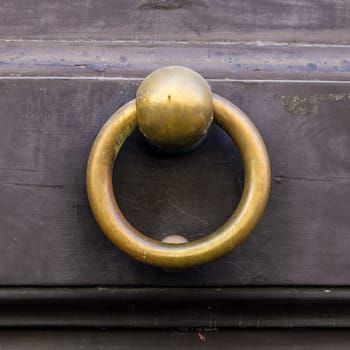 Close up of rustic old door in Florence, Italy.