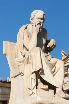 classical statue of Socrates sitting