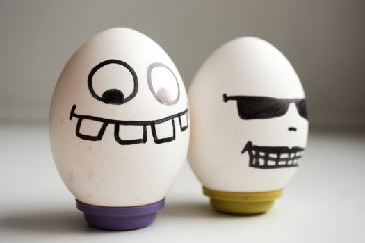 Cheerful eggs. cool with glasses. photo for your design