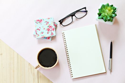 Still life, business, office supplies or education concept : Top view or flat lay of open notebook paper with blank pages, accessories and coffee cup on wooden background, ready for adding or mock up