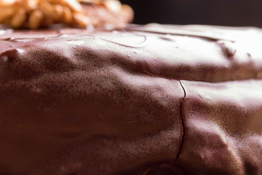 close up of chocolate cake with nuts
