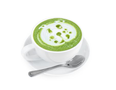 Hot matcha latte art with cute dog face cartoon on glass table on white background