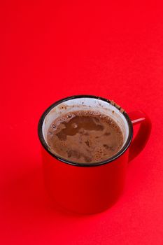 Aromatic cocoa drink. On a black background