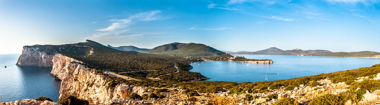 Landscape of the gulf of capo caccia from the Cave of broken vessels at sunset