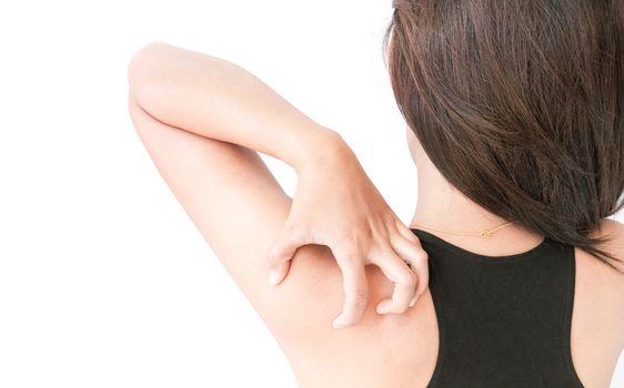 Woman Itching on shoulder with white background for healthy concept