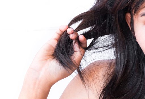 Closeup woman hand holding Hair Breakage proplem with white background