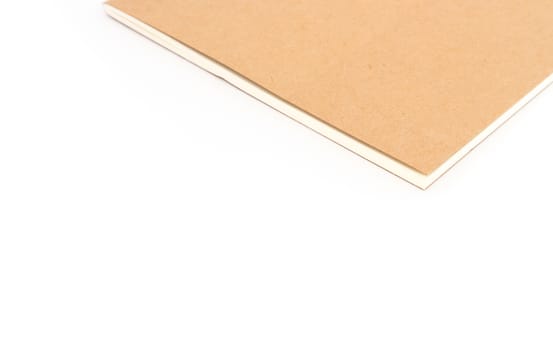 Closeup brown notebook color on white background